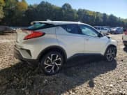 ✅ 2021 Toyota C-HR XLE • VIN: NMTKHMBX5MR126830 • Lot: 86313385. Listed on Copart with 107,697 mi. Free auction sales archive from the USA and detailed vehicle history report at DreamBid. Image 3.