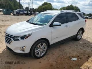 2020 Chevrolet Equinox Premier z VIN 3GNAXXEV2LS643113, wystawiony jako Copart lot #81096505 z przebiegiem 72 316 mil mil oraz Szkoda całkowita • Salvage title. Historia ofert i sprzedaży dostępna na DreamBid. Obrazek 1.