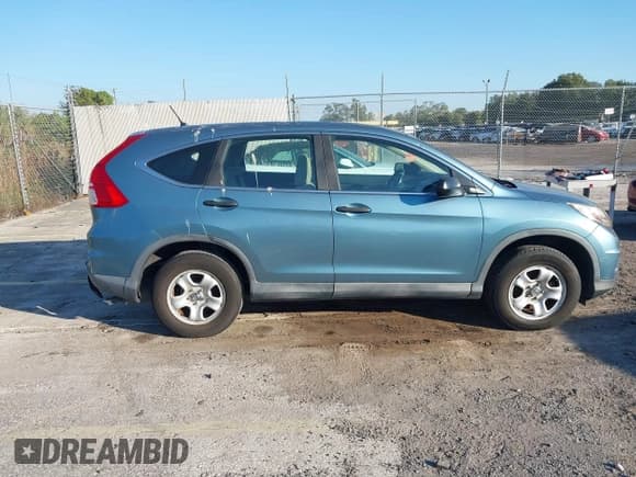 ✅ 2015 Honda CR-V LX • VIN: 2HKRM3H36FH541304 • Lot: 43734820. Listed on IAAI with 197,357 mi. Free auction sales archive from the USA and detailed vehicle history report at DreamBid. Image 13.