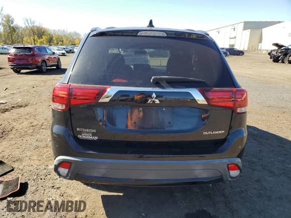 2018 Mitsubishi Outlander SE with VIN JA4AD3A32JZ048318, listed as a Copart auction lot 86997295 with 119,293 mi miles and Salvage title. Bid and sale history available at DreamBid. Image 6.