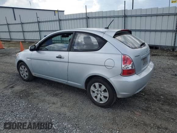 2010 Hyundai Accent GS z VIN KMHCM3AC6AU157310, wystawiony jako Copart lot #71661084 z przebiegiem 185 132 mil mil oraz Szkoda całkowita • Salvage title. Historia ofert i sprzedaży dostępna na DreamBid. Obrazek 2.