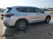 ✅ 2019 Hyundai Santa Fe SE • VIN: 5NMS23AD6KH014798 • Lot: 67141024. Wystawiony na Copart z przebiegiem Nie podano. Bezpłatny archiwum sprzedaży aukcyjnych z USA i szczegółowy raport historii pojazdu na DreamBid. Zdjęcie 3.