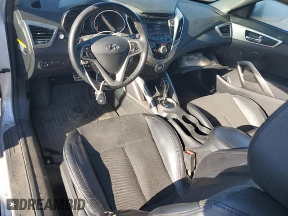 ✅ 2013 Hyundai Veloster w/Black Int • VIN: KMHTC6AD7DU086250 • Lot: 88927285. Wystawiony na Copart z przebiegiem 171 779 mil. Bezpłatny archiwum sprzedaży aukcyjnych z USA i szczegółowy raport historii pojazdu na DreamBid. Zdjęcie 8.