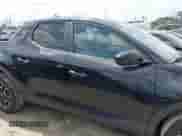 2022 Hyundai Santa Cruz SE with VIN 5NTJA4AE6NH003287, listed as a IAAI auction lot 41957238 with 39,113 mi miles and . Bid and sale history available at DreamBid. Image 13.