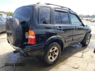 ✅ 2002 Chevrolet Tracker ZR2 • VIN: 2CNBJ734626925000 • Лот: 48870524. Опубликован ранее на Copart с пробегом 265 330 миль. Бесплатный доступ к архиву аукционных продаж из США и подробный отчёт об истории автомобиля на DreamBid. Изображение 3.