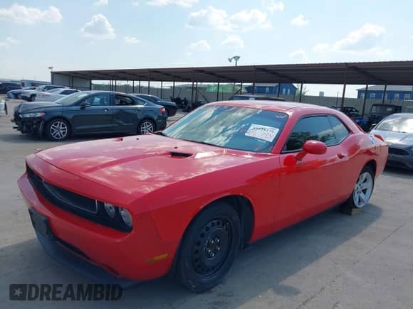 2014 Dodge Challenger SXT z VIN 2C3CDYAG5EH294823, wystawiony jako IAAI lot #43238375 z przebiegiem 153 229 mil mil oraz . Historia ofert i sprzedaży dostępna na DreamBid. Obrazek 19.