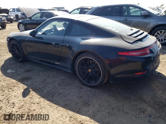 ✅ 2015 Porsche 911 Carrera • VIN: WP0AA2A98FS106543 • Lot: 73144614. Listed on Copart with 16,987 mi. Free auction sales archive from the USA and detailed vehicle history report at DreamBid. Image 2.