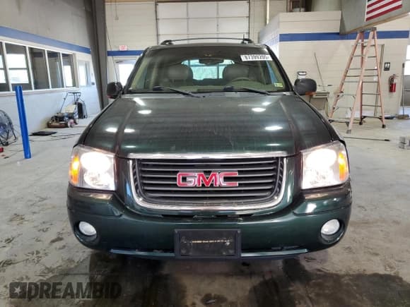 ✅ 2004 GMC Envoy SLE • VIN: 1GKDT13S142189624 • Лот: 87399205. Опубликован ранее на Copart с пробегом 203 008 миль. Бесплатный доступ к архиву аукционных продаж из США и подробный отчёт об истории автомобиля на DreamBid. Изображение 5.