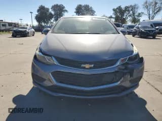 ✅ 2018 Chevrolet Cruze LT • VIN: 1G1BE5SM5J7136150 • Lot: 82736055. Listed on Copart with 138,719 mi. Free auction sales archive from the USA and detailed vehicle history report at DreamBid. Image 5.
