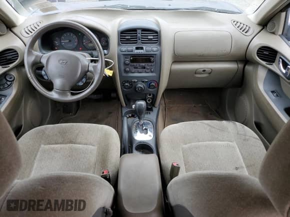 2004 Hyundai Santa Fe GLS z VIN KM8SC73DX4U770675, wystawiony jako Copart lot #70331224 z przebiegiem 134 785 mil mil oraz Czysty tytuł • Clean title. Historia ofert i sprzedaży dostępna na DreamBid. Obrazek 8.