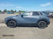 ✅ 2022 Mazda CX-30 S Carbon Edition • VIN: 3MVDMBCL8NM422737 • Lot: 42229336. Listed on IAAI with 14,665 mi. Free auction sales archive from the USA and detailed vehicle history report at DreamBid. Image 14.