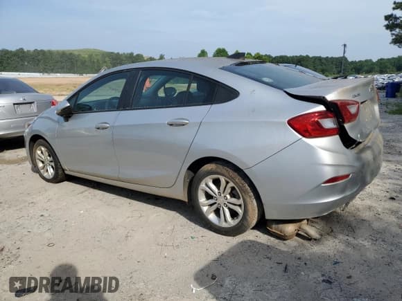 ✅ 2019 Chevrolet Cruze LS • VIN: 1G1BC5SM2K7151731 • Lot: 61159983. Listed on Copart with 102,978 mi. Free auction sales archive from the USA and detailed vehicle history report at DreamBid. Image 2.