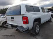✅ 2018 GMC Sierra 1500 SLE • VIN: 3GTU2MEC4JG296644 • Lot: 43752275. Listed on IAAI with 149,436 mi. Free auction sales archive from the USA and detailed vehicle history report at DreamBid. Image 4.
