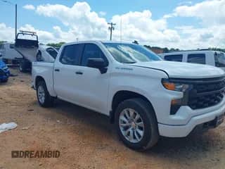 2023 Chevrolet Silverado 1500 Custom z VIN 3GCPDBEK0PG269601, wystawiony jako IAAI lot #42733325 z przebiegiem 34 553 mil mil oraz . Historia ofert i sprzedaży dostępna na DreamBid. Obrazek 1.