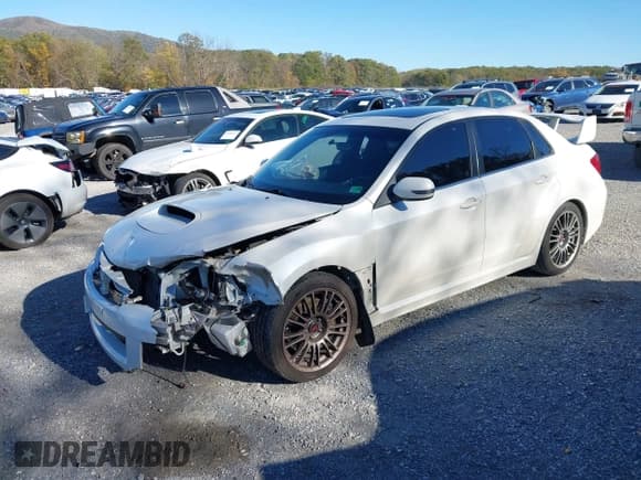 ✅ 2014 Subaru WRX WRX STI • VIN: JF1GV8J68EL011938 • Lot: 43463666. Listed on IAAI with 89,207 mi. Free auction sales archive from the USA and detailed vehicle history report at DreamBid. Image 18.