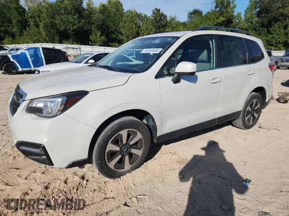2017 Subaru Forester Limited with VIN JF2SJARCXHH523100, listed as a Copart auction lot 84559495 with 94,988 mi miles and Salvage title. Bid and sale history available at DreamBid. Image 1.