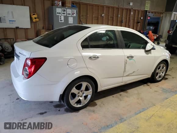 2012 Chevrolet Sonic LTZ with VIN 1G1JE5SH9C4143735, listed as a Copart auction lot 47083355 with 109,585 mi miles and Salvage title. Bid and sale history available at DreamBid. Image 3.