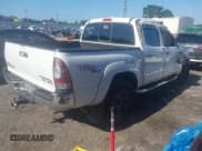 ✅ 2010 Toyota Tacoma PreRunner • VIN: 3TMJU4GNXAM103720 • Lot: 42994037. Listed on IAAI with 214,592 mi. Free auction sales archive from the USA and detailed vehicle history report at DreamBid. Image 4.