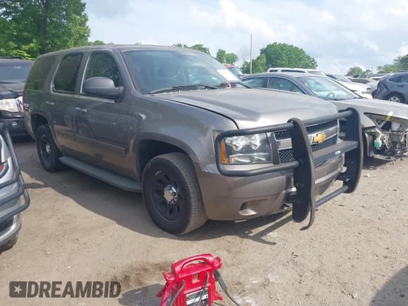 ✅ 2012 Chevrolet Tahoe Commercial • VIN: 1GNLC2E07CR187432 • Lot: 42126539. Wystawiony na IAAI z przebiegiem 169 607 mil. Bezpłatny archiwum sprzedaży aukcyjnych z USA i szczegółowy raport historii pojazdu na DreamBid. Zdjęcie 1.