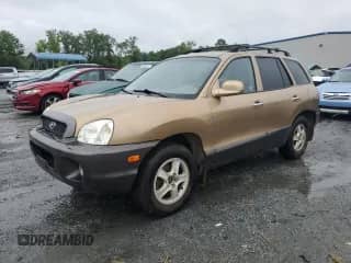 2001 Hyundai Santa Fe GLS z VIN KM8SC83D21U044486, wystawiony jako Copart lot #58143675 z przebiegiem 145 966 mil mil oraz Szkoda całkowita • Salvage title. Historia ofert i sprzedaży dostępna na DreamBid. Obrazek 1.