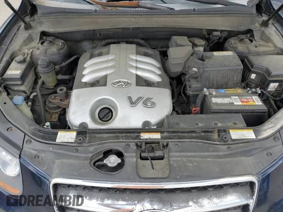 2007 Hyundai Santa Fe SE с VIN 5NMSH13E67H002361, выставлен на аукционе Copart как лот 63677825 с пробегом 327 310 миль миль и Списание • Salvage title. История ставок и продаж доступна на DreamBid. Изображение 12.