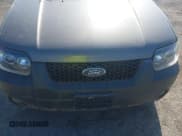 ✅ 2006 Ford Escape XLT • VIN: 1FMYU93116KA07662 • Lot: 42372284. Listed on IAAI with 206,831 mi. Free auction sales archive from the USA and detailed vehicle history report at DreamBid. Image 6.