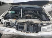 ✅ 2001 Lincoln Town Car Signature • VIN: 1LNHM82W41Y690745 • Lot: 82616445. Listed on Copart with 304,513 mi. Free auction sales archive from the USA and detailed vehicle history report at DreamBid. Image 11.