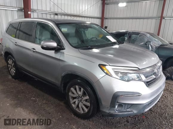 ✅ 2019 Honda Pilot EX-L • VIN: 5FNYF5H52KB034928 • Lot: 42749183. Listed on IAAI with 82,661 mi. Free auction sales archive from the USA and detailed vehicle history report at DreamBid. Image 1.