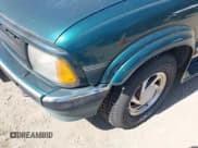 ✅ 1997 Chevrolet Blazer LS • VIN: 1GNDT13WXV2175468 • Lot: 42081531. Wystawiony na IAAI z przebiegiem 148 858 mil. Bezpłatny archiwum sprzedaży aukcyjnych z USA i szczegółowy raport historii pojazdu na DreamBid. Zdjęcie 6.