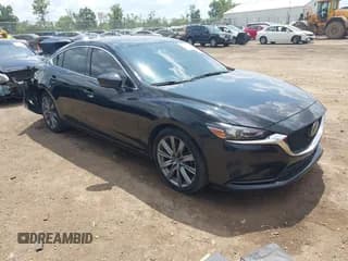 ✅ 2019 Mazda 6 Touring • VIN: JM1GL1VM0K1500423 • Lot: 42954014. Wystawiony na IAAI z przebiegiem 119 104 mil. Bezpłatny archiwum sprzedaży aukcyjnych z USA i szczegółowy raport historii pojazdu na DreamBid. Zdjęcie 1.