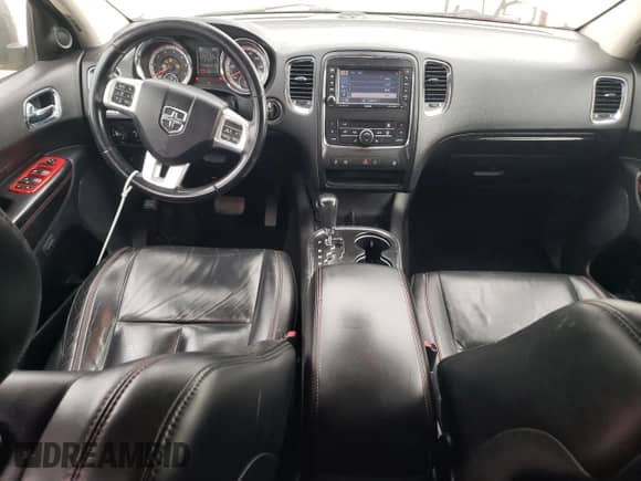 2012 Dodge Durango R/T with VIN 1C4SDJCT2CC147237, listed as a Copart auction lot 82385265 with 174,990 mi miles and Salvage title. Bid and sale history available at DreamBid. Image 8.