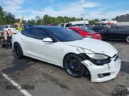 ✅ 2016 Tesla Model S 90D • VIN: 5YJSA1E40GF128340 • Lot: 43308256. Listed on IAAI with 89,394 mi. Free auction sales archive from the USA and detailed vehicle history report at DreamBid. Image 1.