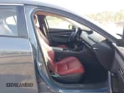 ✅ 2024 Mazda 3 S Carbon Edition • VIN: 3MZBPBCM6RM411828 • Lot: 42802141. Listed on IAAI with 40,061 mi. Free auction sales archive from the USA and detailed vehicle history report at DreamBid. Image 5.