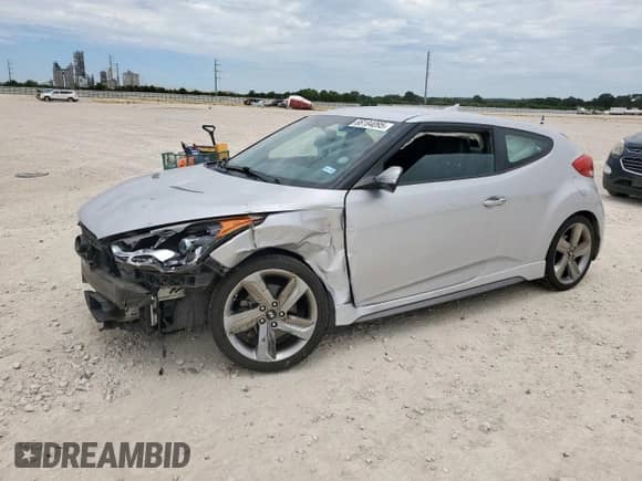 2013 Hyundai Veloster Turbo с VIN KMHTC6AE0DU153926, выставлен на аукционе Copart как лот 66184095 с пробегом 78 193 миль миль и Списание • Salvage title. История ставок и продаж доступна на DreamBid. Изображение 1.