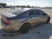 ✅ 2012 Chevrolet Malibu 1LS • VIN: 1G1ZB5E03CF210139 • Lot: 80245914. Listed on Copart with 149,598 mi. Free auction sales archive from the USA and detailed vehicle history report at DreamBid. Image 3.