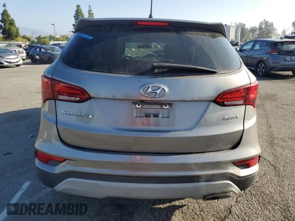 ✅ 2018 Hyundai Santa Fe 2.4L • VIN: 5XYZT3LB5JG545054 • Lot: 91289535. Listed on Copart with 75,555 mi. Free auction sales archive from the USA and detailed vehicle history report at DreamBid. Image 6.