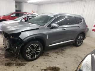 2019 Hyundai Santa Fe Ultimate z VIN 5NMS5CAA0KH046479, wystawiony jako Copart lot #70163692 z przebiegiem 90 234 mil mil oraz . Historia ofert i sprzedaży dostępna na DreamBid. Obrazek 1.