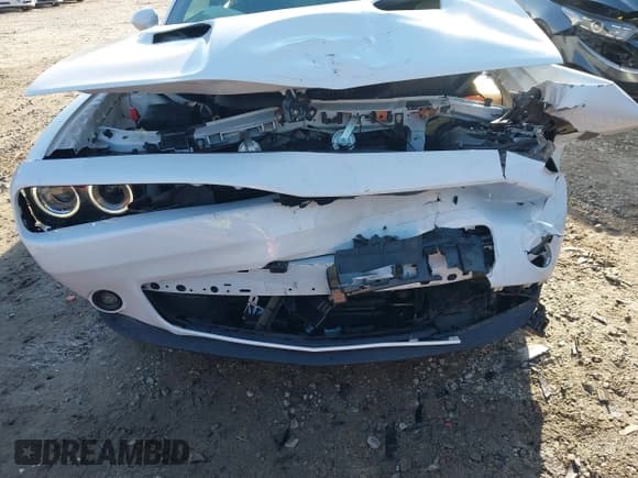 ✅ 2022 Dodge Challenger SXT • VIN: 2C3CDZGG2NH219395 • Lot: 41000935. Listed on IAAI with 22,551 mi. Free auction sales archive from the USA and detailed vehicle history report at DreamBid. Image 6.