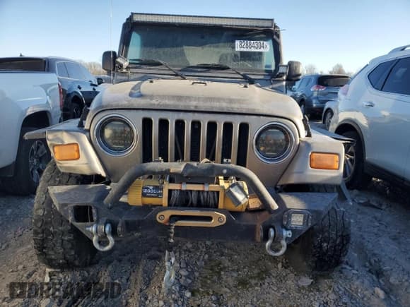 ✅ 2004 Jeep Wrangler Rubicon • VIN: 1J4FA69S94P778836 • Lot: 82884304. Wystawiony na Copart z przebiegiem 168 045 mil. Bezpłatny archiwum sprzedaży aukcyjnych z USA i szczegółowy raport historii pojazdu na DreamBid. Zdjęcie 5.