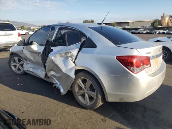 ✅ 2014 Chevrolet Cruze 2LT • VIN: 1G1PE5SB0E7335682 • Lot: 82730995. Listed on Copart with 136,256 mi. Free auction sales archive from the USA and detailed vehicle history report at DreamBid. Image 2.