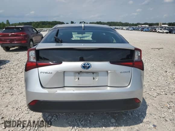 2022 Toyota Prius L Eco с VIN JTDKAMFU3N3184279, выставлен на аукционе Copart как лот 68371565 с пробегом 179 376 миль миль и На запчасти • Non repairable. История ставок и продаж доступна на DreamBid. Изображение 6.