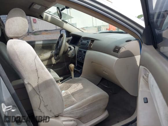 ✅ 2003 Toyota Corolla CE • VIN: JTDBR32E730047927 • Lot: 42324214. Listed on IAAI with 267,828 mi. Free auction sales archive from the USA and detailed vehicle history report at DreamBid. Image 5.