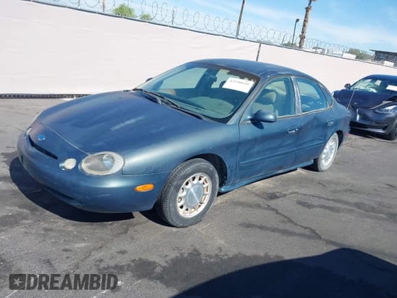 ✅ 1996 Ford Taurus LX • VIN: 1FALP53S0TG125665 • Лот: 42290691. Опубликован ранее на IAAI с пробегом 91 152 миль. Бесплатный доступ к архиву аукционных продаж из США и подробный отчёт об истории автомобиля на DreamBid. Изображение 12.