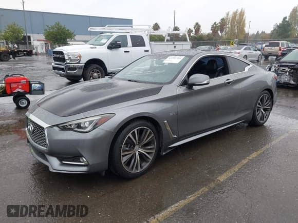 ✅ 2018 Infiniti Q60 Luxe • VIN: JN1EV7EL7JM391597 • Лот: 43703404. Опубликован ранее на IAAI с пробегом 49 485 миль. Бесплатный доступ к архиву аукционных продаж из США и подробный отчёт об истории автомобиля на DreamBid. Изображение 16.