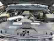 2000 Chevrolet Silverado 1500 LT z VIN 2GCEK19T3Y1154611, wystawiony jako Copart lot #66749694 z przebiegiem 186 003 mil mil oraz Szkoda całkowita • Salvage title. Historia ofert i sprzedaży dostępna na DreamBid. Obrazek 11.