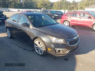 ✅ 2015 Chevrolet Cruze LTZ • VIN: 1G1PG5SB4F7141491 • Lot: 43593711. Listed on IAAI with 112,639 mi. Free auction sales archive from the USA and detailed vehicle history report at DreamBid. Image 1.