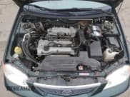 ✅ 2001 Mazda Protege DX • VIN: JM1BJ222910404111 • Лот: 88333775. Опубликован ранее на Copart с пробегом 171 876 миль. Бесплатный доступ к архиву аукционных продаж из США и подробный отчёт об истории автомобиля на DreamBid. Изображение 11.