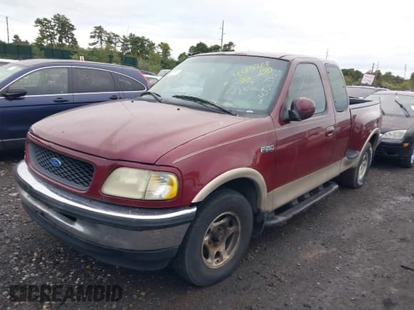 ✅ 1997 Ford F-150 XL • VIN: 1FTEX07L8VKD65636 • Lot: 40187663. Wystawiony na IAAI z przebiegiem 88 587 mil. Bezpłatny archiwum sprzedaży aukcyjnych z USA i szczegółowy raport historii pojazdu na DreamBid. Zdjęcie 2.