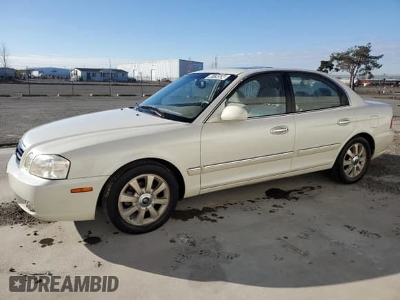 ✅ 2006 Kia Optima LX • VIN: KNAGD128365438113 • Лот: 46134534. Опубликован ранее на Copart с пробегом 169 627 миль. Бесплатный доступ к архиву аукционных продаж из США и подробный отчёт об истории автомобиля на DreamBid. Изображение 1.