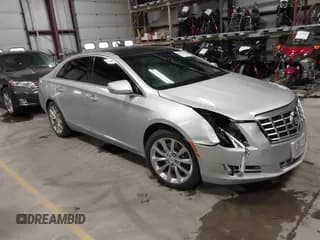✅ 2014 Cadillac XTS Luxury • VIN: 2G61N5S39E9292693 • Lot: 43661560. Listed on IAAI with 189,083 mi. Free auction sales archive from the USA and detailed vehicle history report at DreamBid. Image 1.